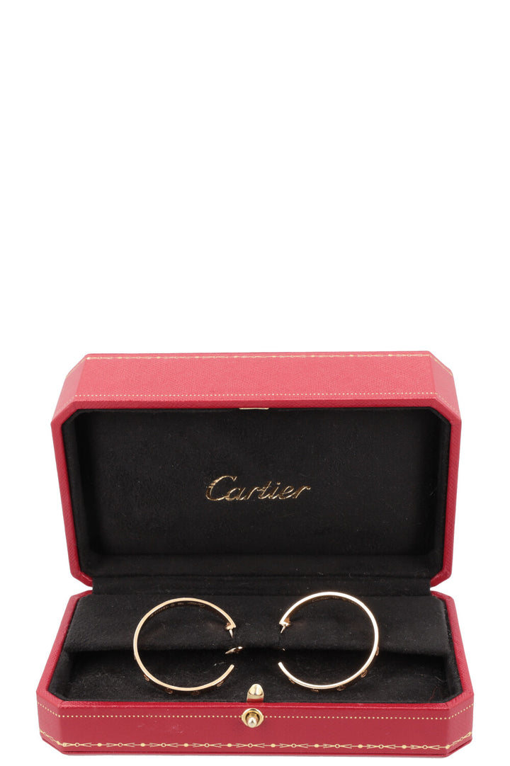 CARTIER Boucles d'oreilles créoles Love en or jaune 18 carats